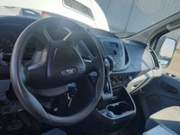 The 2017 Ford Transit Cargo Van in white with an automatic transmission and RWD drivetrain is specif... (image 8)