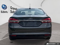 2018 Ford Fusion SE Vehicle Highlights Back Up Camera CarPlay Heated Seats Seamlessly navigate your... (image 3)