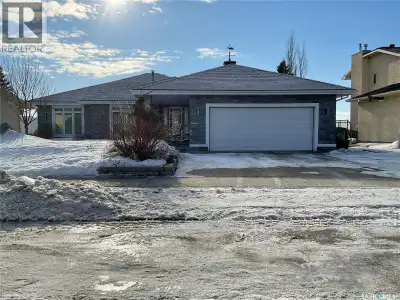 Welcome to this stunning executive home located in the prestigious Westhill neighborhood of Regina....