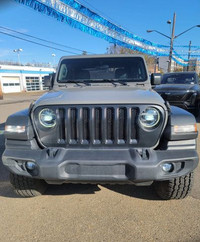 This Jeep Wrangler Sport boasts a Intercooled Turbo Premium Unleaded I-4 2.0 L/122 engine powering t... (image 2)