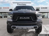Dominate every road and task in this robust 2021 Ram 1500 Rebel Crew Cab Pickup. Dressed in striking... (image 8)