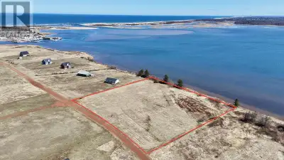 Discover 1.77 acres of pristine waterfront land in the peaceful Harbour View Dunes subdivision of Sa...