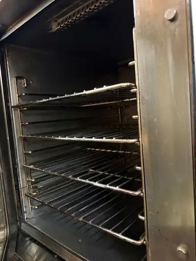 Designed with a durable exterior, the Duke 59-E3V half-size convection oven has a stainless steel fr...
