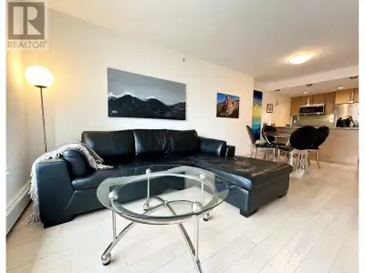 Discover the perfect urban retreat in this furnished condo located in the heart of Vancouver. Offeri...