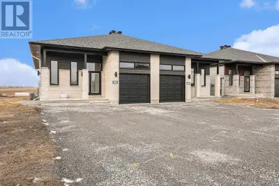 *Photos are of similar unit* Welcome to this BRAND NEW - NEVER LIVED in lower-level 2-bedroom, 1-bat...