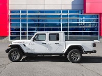 This Jeep Gladiator has a dependable Regular Unleaded V-6 3.6 L/220 engine powering this Automatic t... (image 1)