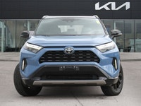 The highly anticipated 2025 Toyota RAV4 Hybrid XSE, a striking light blue Sport Utility with a sophi... (image 1)