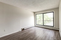 Amenities: Air Conditioning • Affordable Parking • Heat & Water Included Suite & Building: Spacious... (image 7)