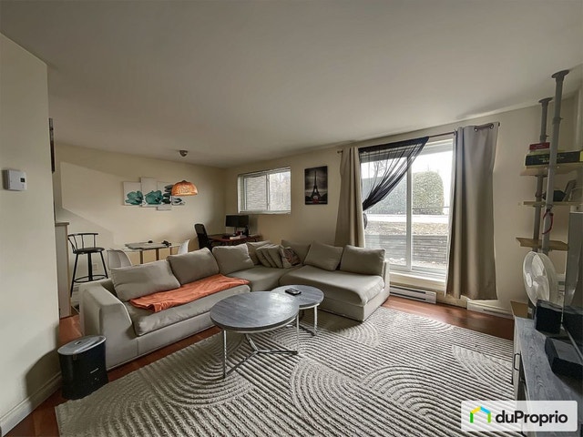 $319,000 - Condominium for sale in Laval-des-Rapides — photo 1