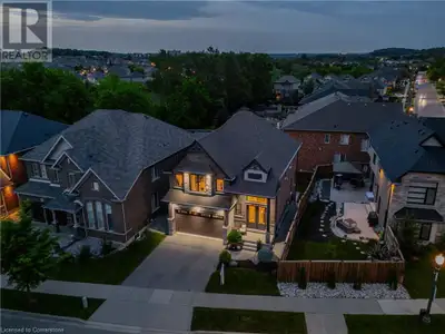 Luxurious Former Model Home w/ Walkout Basement in Prestigious Doon Creek-Welcome to 204 Evens Pond...