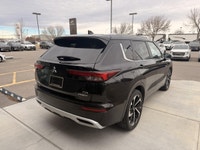 The 2023 Mitsubishi Outlander PHEV LE is a plug-in hybrid SUV that combines fuel efficiency, electri... (image 4)
