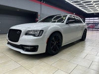The 2023 Chrysler 300, particularly the 300C RWD in pristine white, is a powerful sedan that truly s... (image 9)