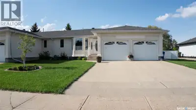 Enjoy the perfect blend of low-maintenance living and the privacy in this beautifully updated bungal...