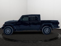 This 2026 JEEP GLADIATOR SPORT 4X4 has the following options Cloth Low-Back Bucket Seats, Remote Sta... (image 1)