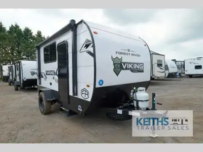 Forest River Viking ROK travel trailer 12000ROK highlights: 54in.in. x 74in.in. Flip-Up Bed Gaucho S...