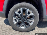 KBB.com 10 Best All-Wheel-Drive Vehicles Under $25,000. This Jeep Compass has a trusty Regular Unlea... (image 8)