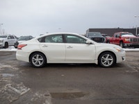 This 2014 Nissan Altima is powered by a smooth and efficient 2.5L four-cylinder engine paired with a... (image 8)