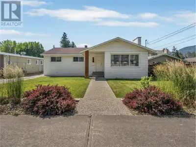 Charming Character Home Just a Short Stroll to Skaha Lake! Fall in love with this warm and inviting...