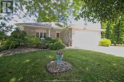 Step into this well-loved brick bungalow featuring three spacious bedrooms upstairs and a 4th on the...