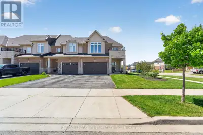 Welcome to this beautifully upgraded and enhanced end-unit townhouse Garage attached only nestled in...