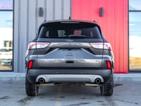 Carget Supercentre is proud to present this 2020 Ford Escape Titanium Hybrid! EXTERIOR: MAGNETIC MET... (image 6)