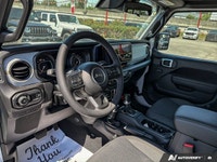This Jeep Wrangler delivers a Regular Unleaded V-6 3.6 L/220 engine powering this Automatic transmis... (image 9)
