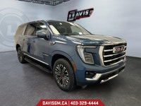 The 2025 GMC Yukon XL Elevation 4WD commands attention with bold styling, extended cargo versatility... (image 6)