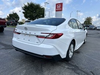Experience effortless driving with this 2025 Toyota Camry SE, boasting a pristine white exterior and... (image 4)