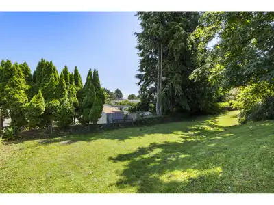 ON THE CORNER OF MONARCH COURT! Rare opportunity to own a massive 1/3-acre corner lot on a quiet no-...