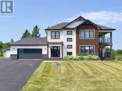 Welcome to 42 McGregor Drive?an exceptional home nestled on a beautifully landscaped half-acre lot i...