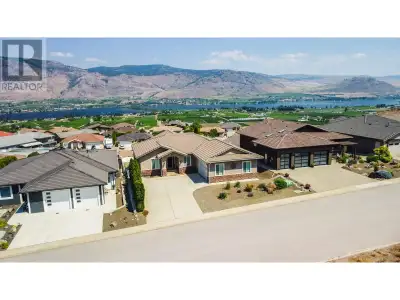 PANORAMIC OSOYOOS LAKE VIEWS! LUXURIOUS CUSTOM HOME WITH ENDLESS POTENTIAL! Discover unparalleled vi...