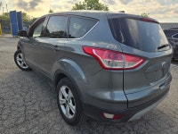 Experience the perfect blend of versatility and efficiency with the 2014 Ford Escape SE, designed fo... (image 6)