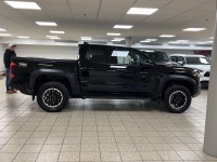 Engineered for drivers who want capability without compromising conscience, this 2025 Toyota Tacoma... (image 6)