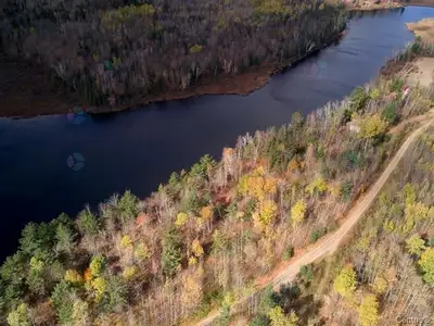 Four waterfront lots on Lac Litchfield -- now that's an opportunity worth exploring. This vacant pro...