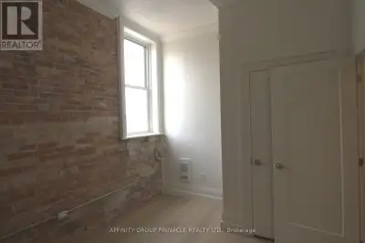 Welcome to this exceptional second-floor walk-up apartment - a unique and versatile live/work reside...