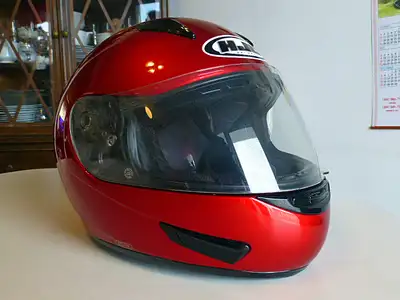 HJC CL-15 full face motorcycle riding helmet in candy red. This helmet has a flow through ventilatio...