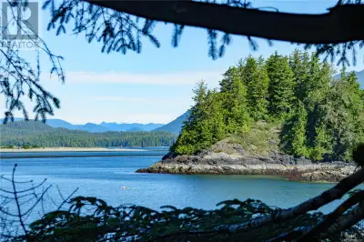 Perched above Duffin Cove with panoramic views of Felice (Round) Island, this rare 0.17-acre oceanfr...