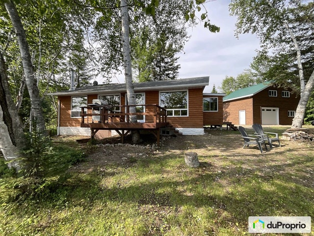$535,000 - Cottage for sale in Mandeville — photo 1