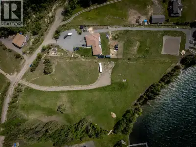 Rare opportunity to own a south-facing waterfront lot on beautiful Bridge Lake. This incredible 2.36...