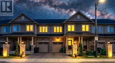 Stunning townhome with over $47,000 in upgrades! Situated on a premium ravine lot with no rear neigh...
