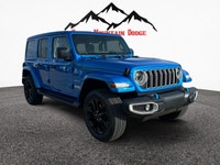 THIS WRANGLER SAHARA UNLIMITED COMES WITH THE 2.0L DOHC PHEV ENGINE, PREMIUM MCKINLEY HEATED LEATHER... (image 6)