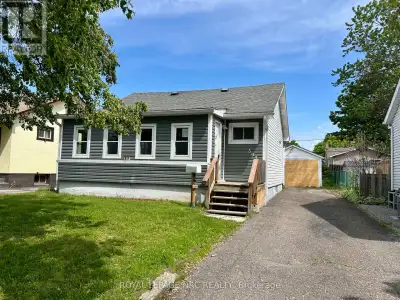 Investors take notice! This cute 2 bedroom bungalow-loft has a detached single car garage, fenced ya...