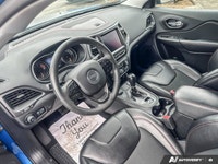 Conquer any terrain with this stunning 2022 Jeep Cherokee Trailhawk, finished in a captivating Hydro... (image 9)