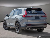 Step into the future with the 2026 Honda CR-V Hybrid Touring in a stunning gray finish and all-wheel... (image 3)