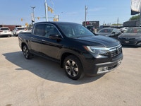 2019 Honda Ridgeline Touring AWD – Luxury, Capability & Reliability Loeppky Auto Sales is proud to o... (image 6)