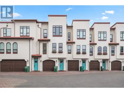 Discover the pinnacle of resort-style living at Lakeshore at Manteo. This exceptional townhome inclu...