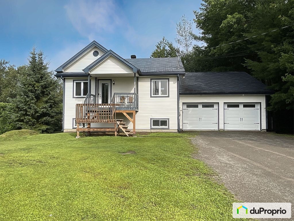 $638,000 - Bungalow for sale in Ste-Sophie — photo 1