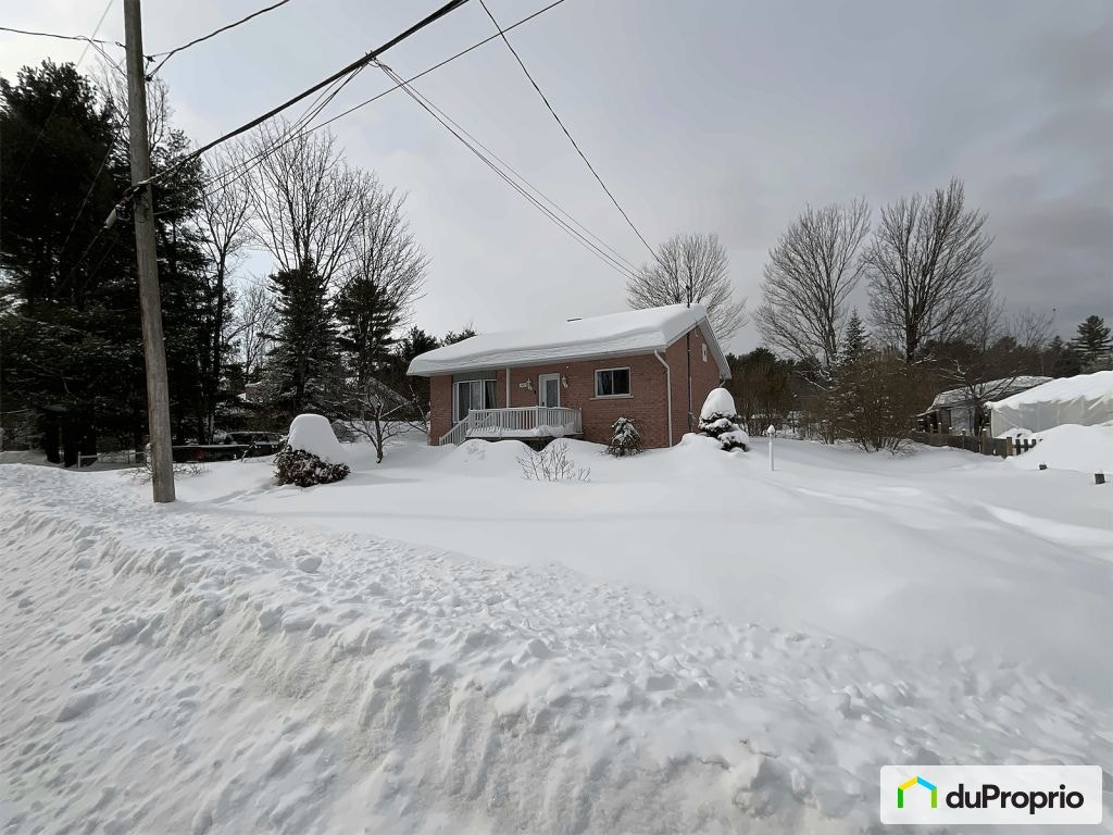 $465,000 - Bungalow for sale in St-Lin-Laurentides — photo 1