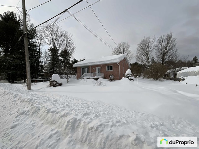 $465,000 - Bungalow for sale in St-Lin-Laurentides — photo 1