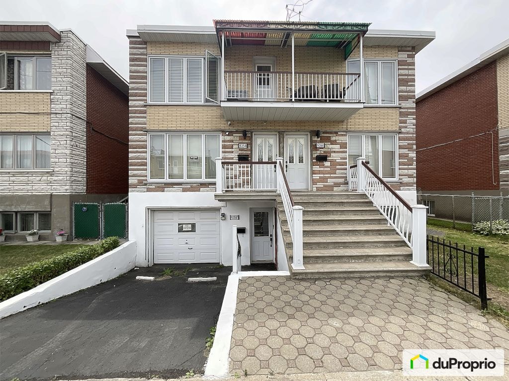 $958,000 - Triplex in Villeray / St-Michel / Parc-Extension — photo 1